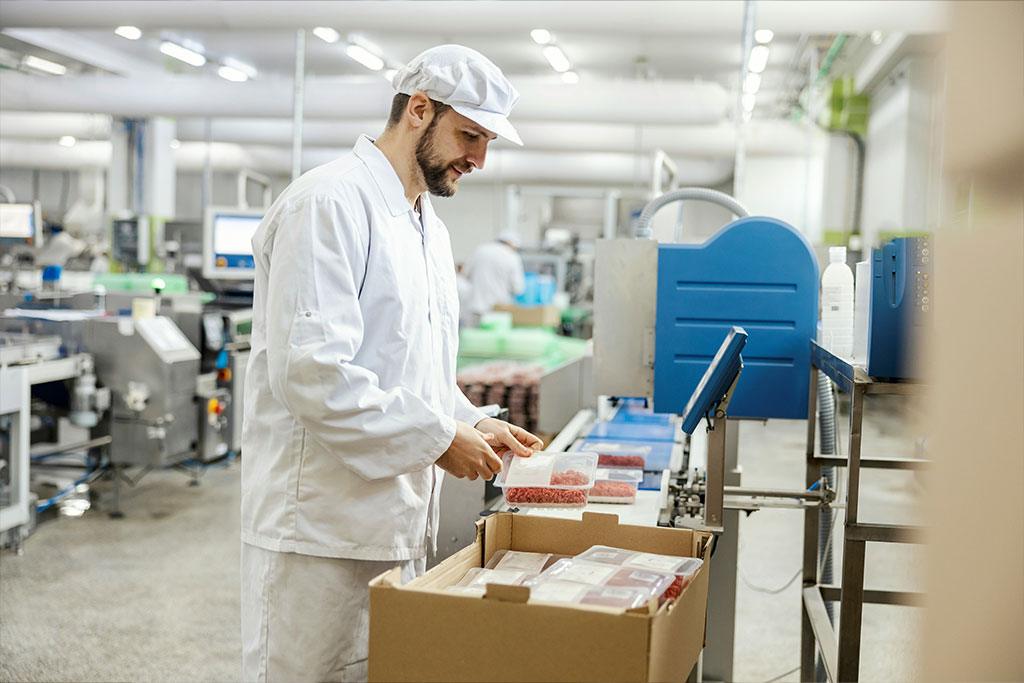 warehouse worker packaging product